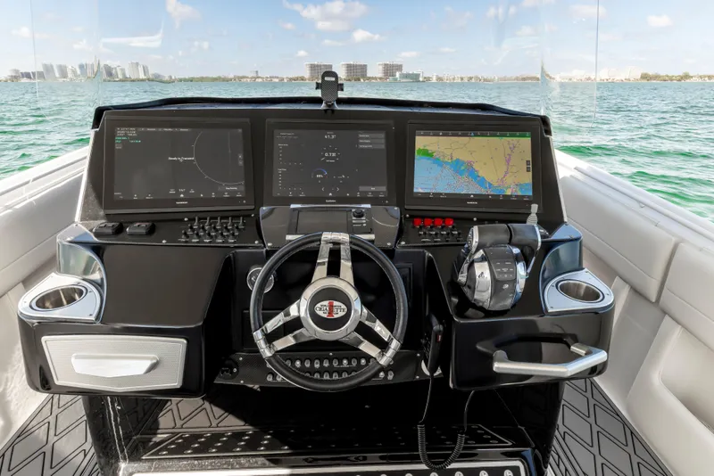 Slide: The Image of Cockpit of 2016 Cigarette 41 GTR boat with advanced navigation displays. - 32