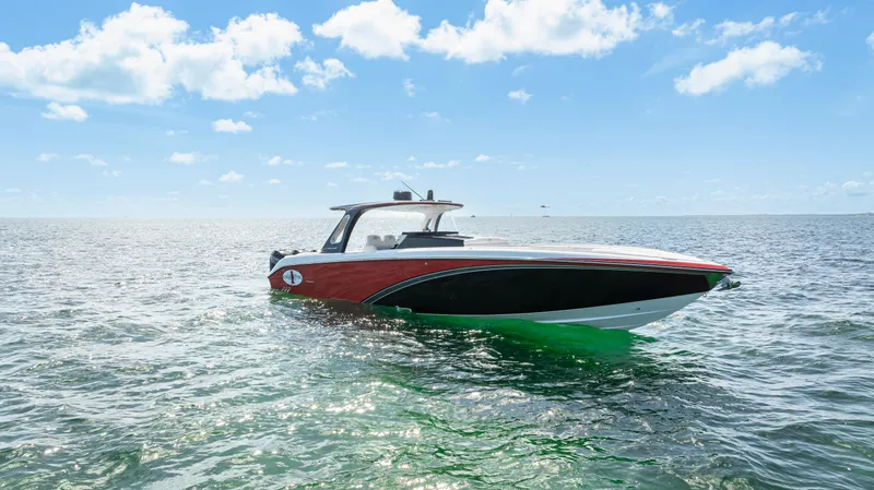 The Image of 2016 Cigarette 41 GTR boat on open water under a clear sky. - 6