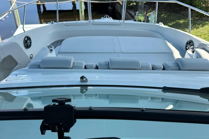 Slide: The Image of 2020 Sea Ray 32 Sundancer Outboard boat with spacious seating and sleek design. - 17