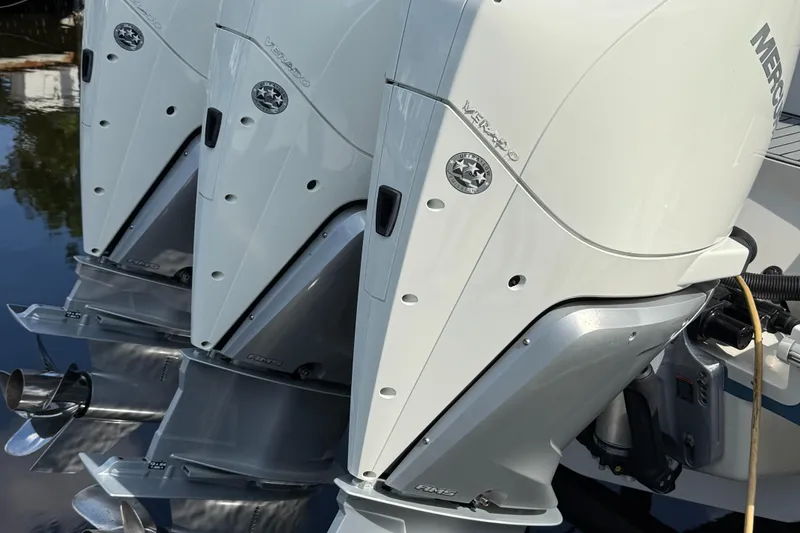 Slide: The Image of Triple Mercury outboard engines on 2020 Sea Ray 32 Sundancer boat. - 2
