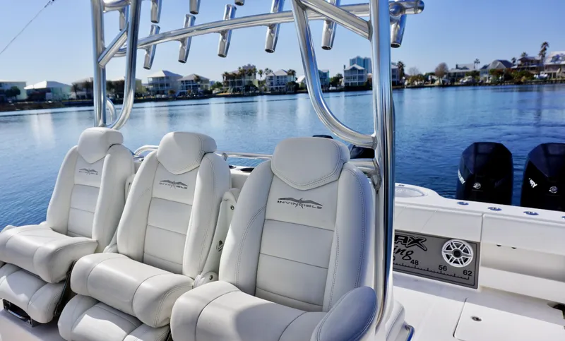 Slide: The Image of Luxury seating on 2021 Invincible 35 Catamaran, featuring sleek design and waterfront view. - 14