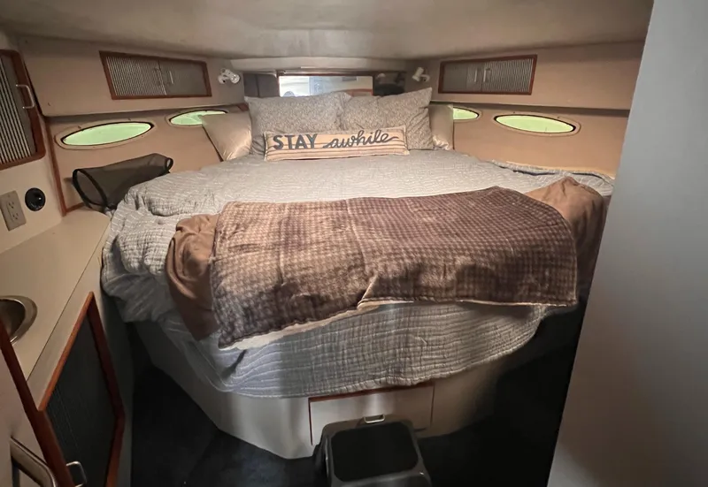 Slide: The Image of Control panel of a 1989 Sea Ray 390 Express Cruiser with switches and keychains. - 18