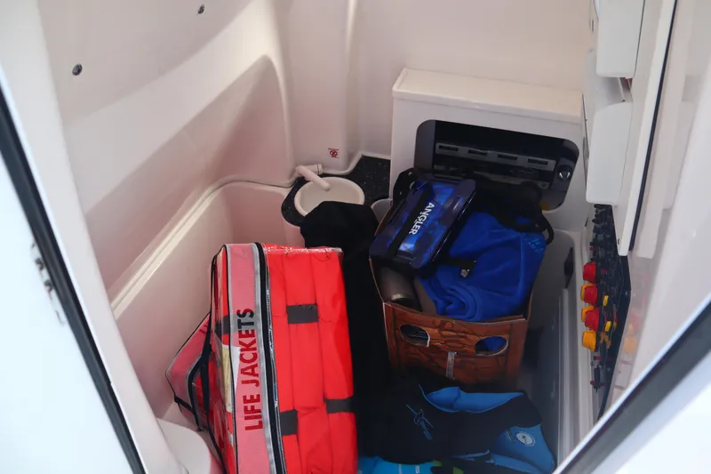 Slide: The Image of Interior storage of 2022 Sea Fox 288 Commander with life jackets and gear. - 10