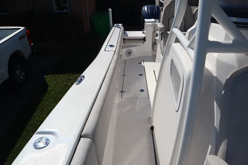 Slide: The Image of 2022 Sea Fox 288 Commander boat interior with seating and storage compartments. - 15