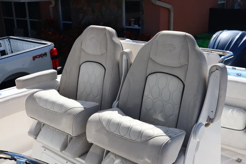 Slide: The Image of 2022 Sea Fox 288 Commander boat seats, featuring plush, ergonomic design and armrests. - 21