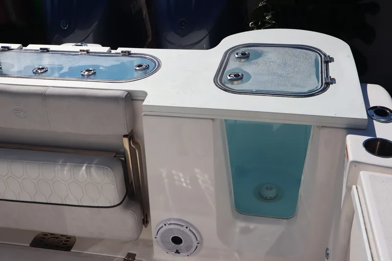 Slide: The Image of 2022 Sea Fox 288 Commander boat interior with seating and storage compartments. - 22