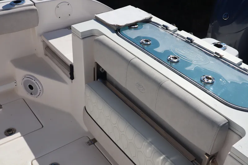 Slide: The Image of 2022 Sea Fox 288 Commander boat interior with seating and livewell. - 24