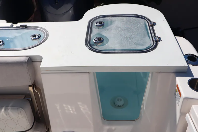 Slide: The Image of 2022 Sea Fox 288 Commander boat with livewell and storage compartments. - 26