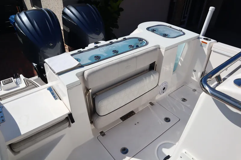 Slide: The Image of 2022 Sea Fox 288 Commander boat interior with dual engines and seating area. - 34