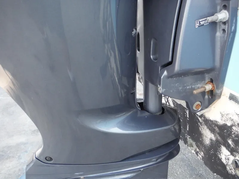 Slide: The Image of Close-up of a 2016 Sea Hunt Escape 235 SE boat motor. - 35