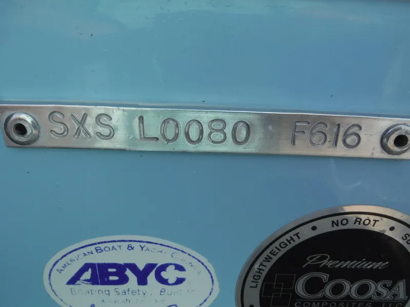 Slide: The Image of 2016 Sea Hunt Escape 235 SE boat identification plate with ABYC and Coosa Composites stickers. - 36