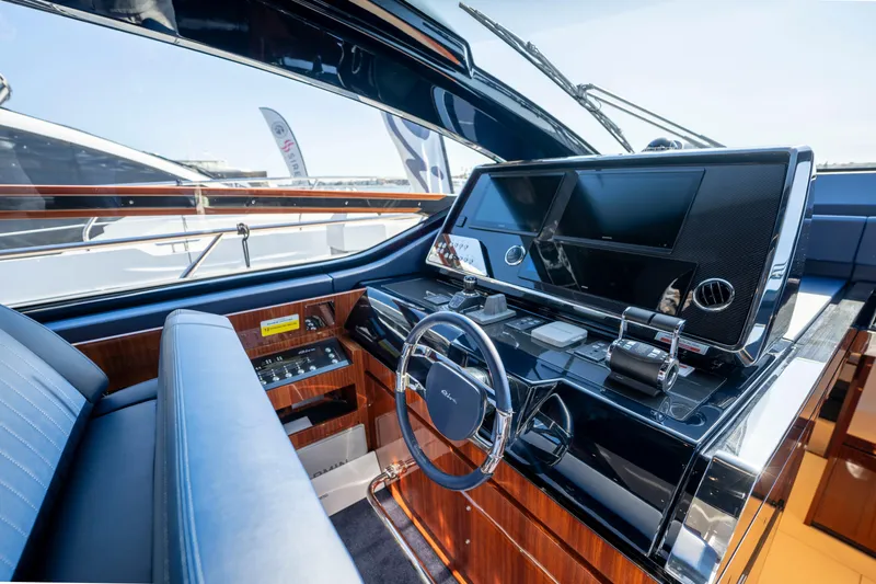 Slide: The Image of Luxurious helm of 2024 Riva 66' Ribelle yacht with modern controls and sleek design. - 20