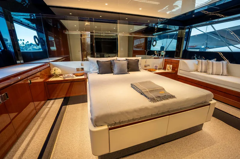 Slide: The Image of Luxurious bedroom interior of 2024 Riva 66' Ribelle yacht with elegant furnishings. - 27