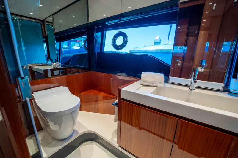 Slide: The Image of Luxurious bathroom interior of 2024 Riva 66' Ribelle yacht with modern fixtures. - 28