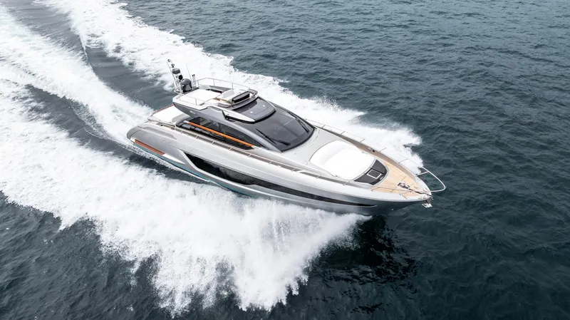 Slide: The Image of 2024 Riva 66' Ribelle yacht cruising on open water. - 3