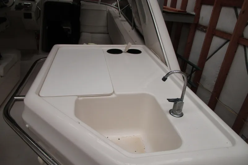 Slide: The Image of 1999 Bayliner 4788 Pilot House Motoryacht interior with sink and counter area. - 37