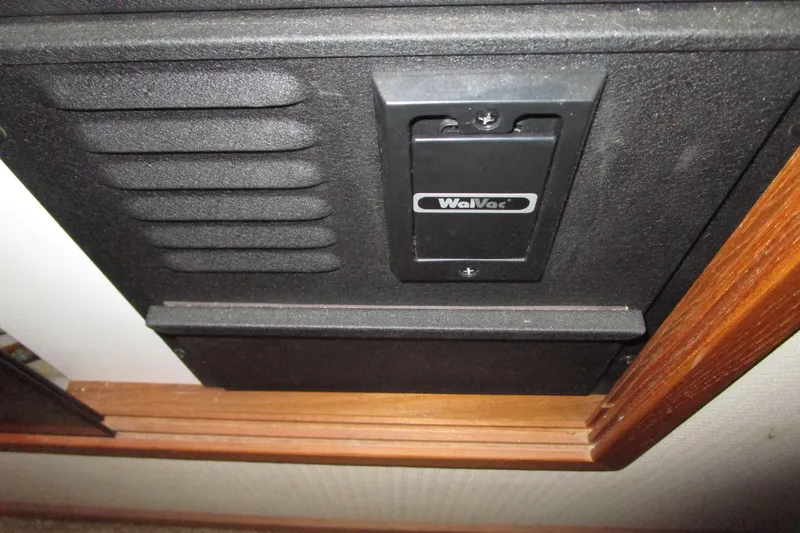 Slide: The Image of Wall-mounted WalVac system in 1999 Bayliner 4788 Pilot House Motoryacht. - 49