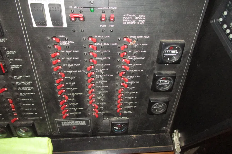 Slide: The Image of Control panel of a 1999 Bayliner 4788 Pilot House Motoryacht with switches and gauges. - 70