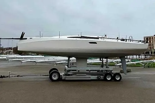 Slide: The Image of 2025 X-Yachts XR 41 sailboat on trailer at marina, side view. - 4