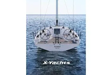 Slide: The Image of 2027 X-Yachts XR 41 sailboat on open water, showcasing sleek design and dual steering wheels. - 10