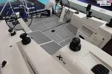 Slide: The Image of 2027 X-Yachts XR 41 sailboat cockpit with modern design and steering wheels. - 17