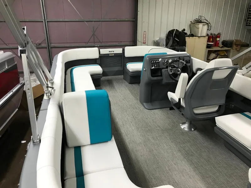 Slide: The Image of 2025 Avalon AURA boat interior with modern seating and sleek design. - 11