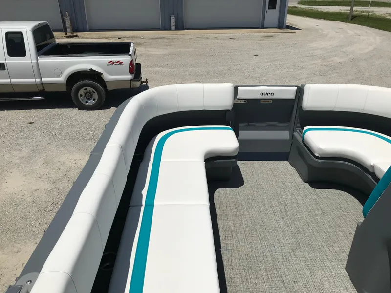 Slide: The Image of 2025 Avalon AURA boat interior with steering wheel and seating. - 38