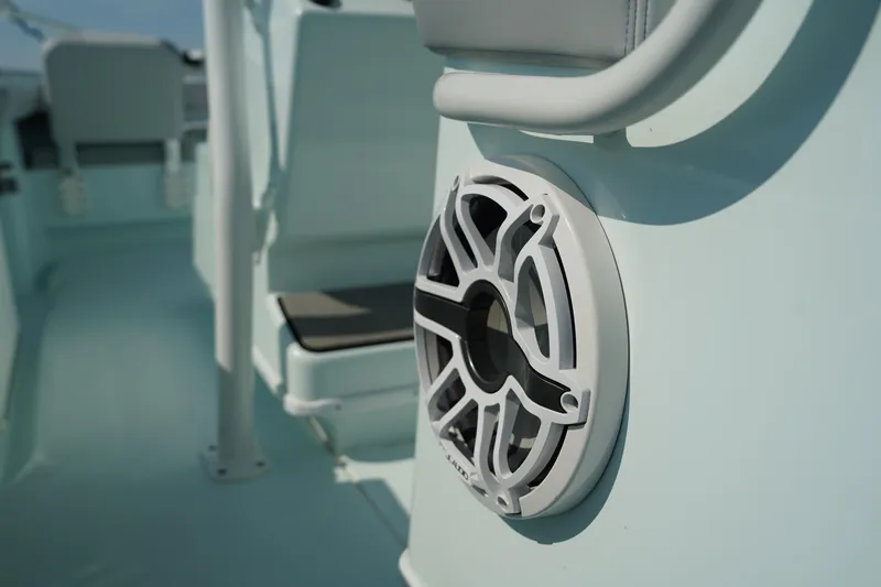 Slide: The Image of 2020 Yellowfin 26 Hybrid boat interior with a mounted speaker. - 19