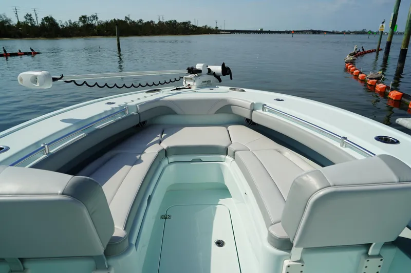 Slide: The Image of 2020 Yellowfin 26 Hybrid boat with spacious seating on calm water. - 33