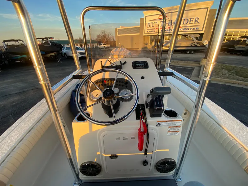 Slide: The Image of 2017 Carolina Skiff Sea Skiff 21CC boat console with steering wheel and controls. - 18