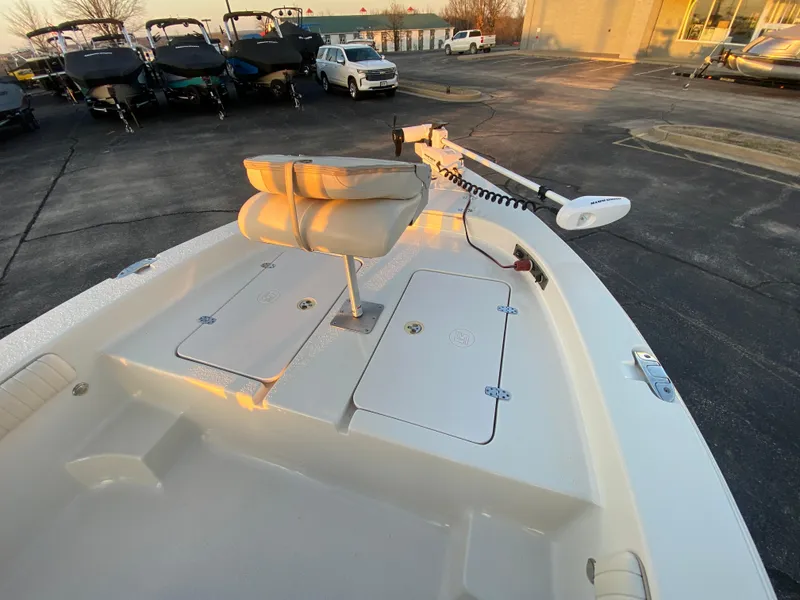 Slide: The Image of 2017 Carolina Skiff Sea Skiff 21CC boat deck with seating and storage compartments. - 24