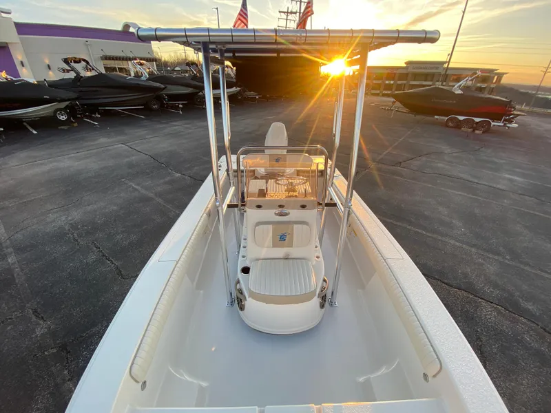 Slide: The Image of 2017 Carolina Skiff Sea Skiff 21CC boat at sunset in a dealership lot. - 28