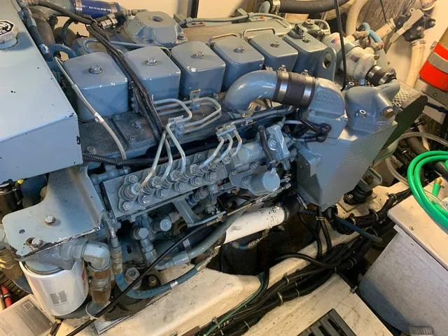 Slide: The Image of Engine room of a 1999 Tiara Yachts 3500 Express, showcasing detailed mechanical components. - 4