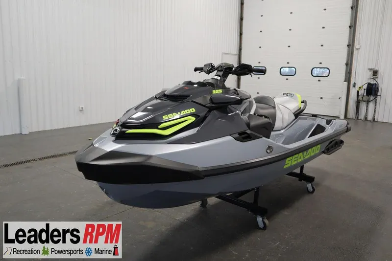 The Image of 2025 Sea-Doo RXT-X™ 325 in Ice Metal and Manta Green, displayed indoors. - 0