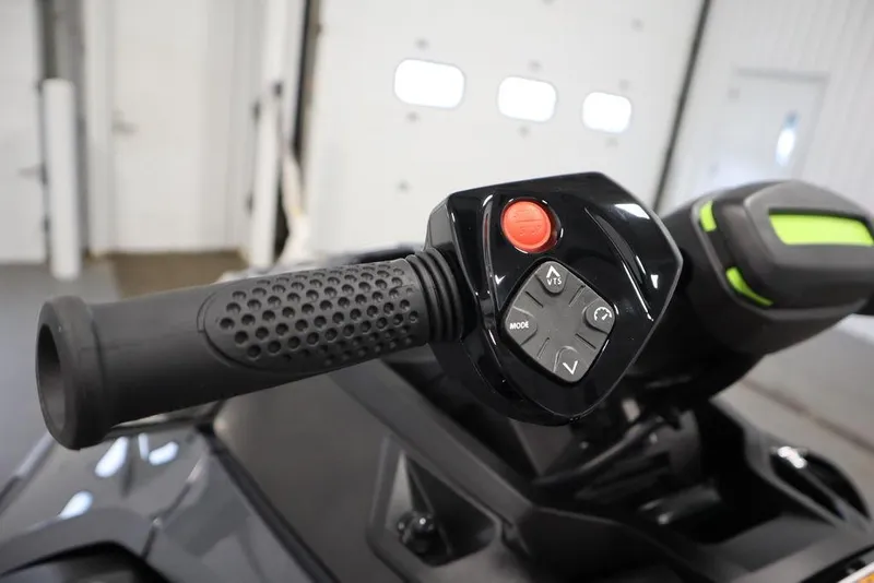 Slide: The Image of 2025 Sea-Doo RXT-X™ 325 handlebar controls, Ice Metal/Manta Green, close-up view. - 11