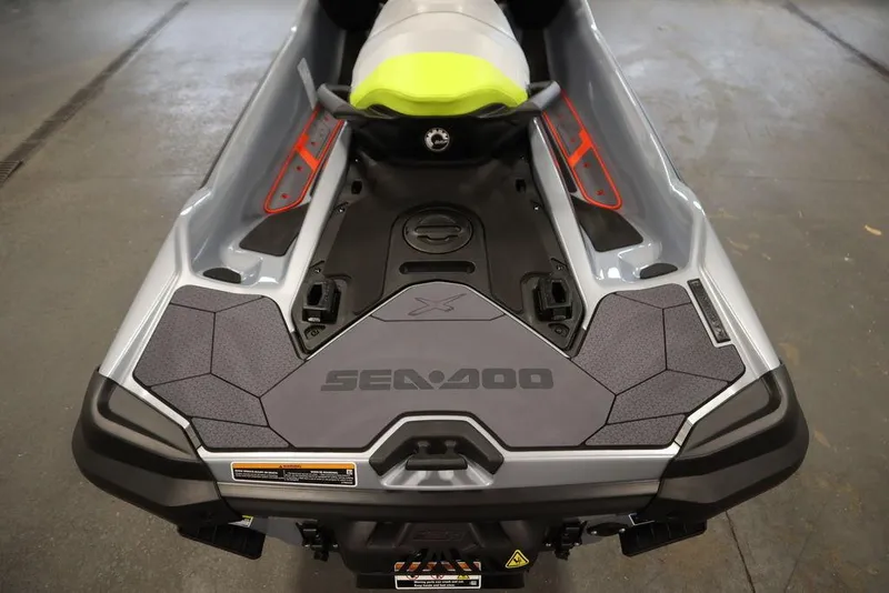 Slide: The Image of 2025 Sea-Doo RXT-X™ 325 in Ice Metal and Manta Green, rear view. - 5