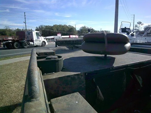 Slide: The Image of Boat interior view with seating, parked near a road, Excel 1854 SWV4T, 2026 model. - 6