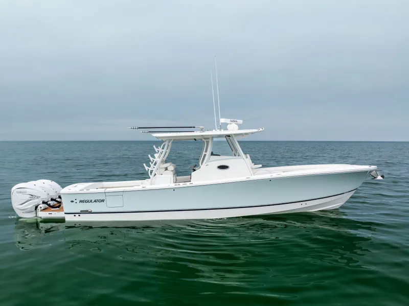 The Image of 2023 Regulator 37 boat on calm ocean waters. - 0