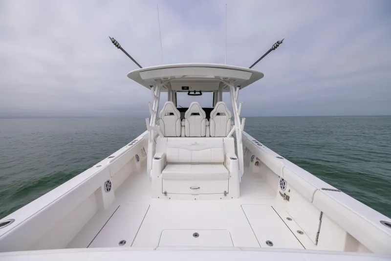 Slide: The Image of 2023 Regulator 37 boat, spacious deck, open sea view. - 28