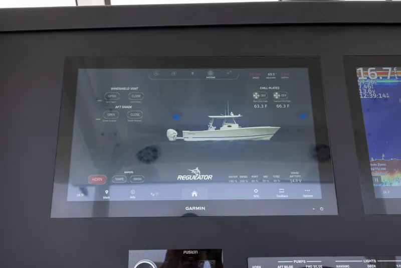 Slide: The Image of Garmin display on 2023 Regulator 37 boat showing navigation and system information. - 45