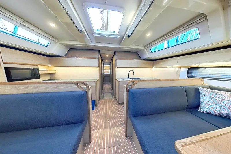 Slide: The Image of Luxurious interior of 2024 Kufner 54 yacht with modern kitchen and seating area. - 19