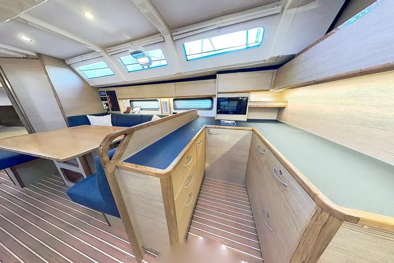 Slide: The Image of Luxurious interior of 2024 Kufner 54 yacht with modern kitchen and dining area. - 20