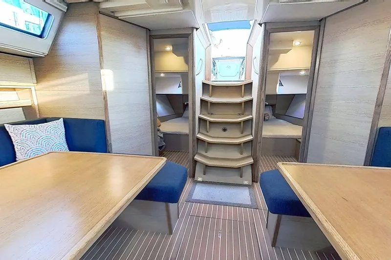 Slide: The Image of Luxurious interior of 2024 Kufner 54 yacht with wooden furnishings and cozy seating. - 38