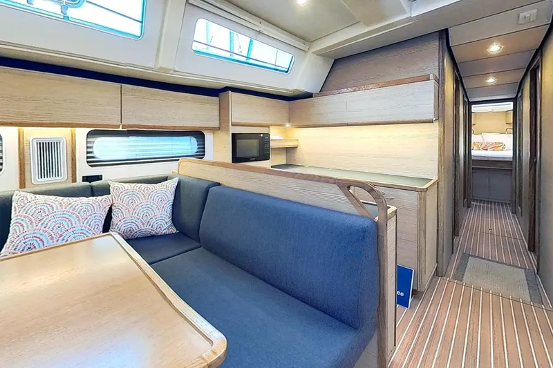 Slide: The Image of Modern interior of 2024 Kufner 54 yacht with cozy seating and stylish decor. - 41