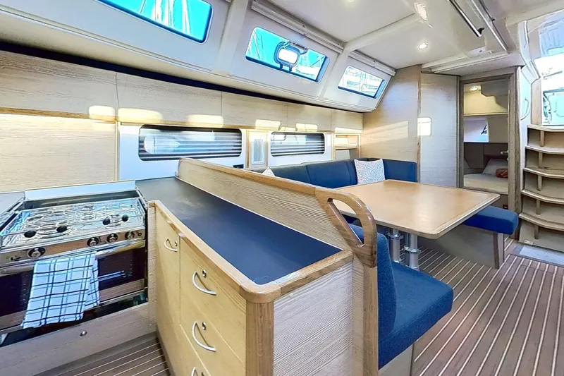 Slide: The Image of Luxurious interior of 2024 Kufner 54 yacht with modern kitchen and dining area. - 44