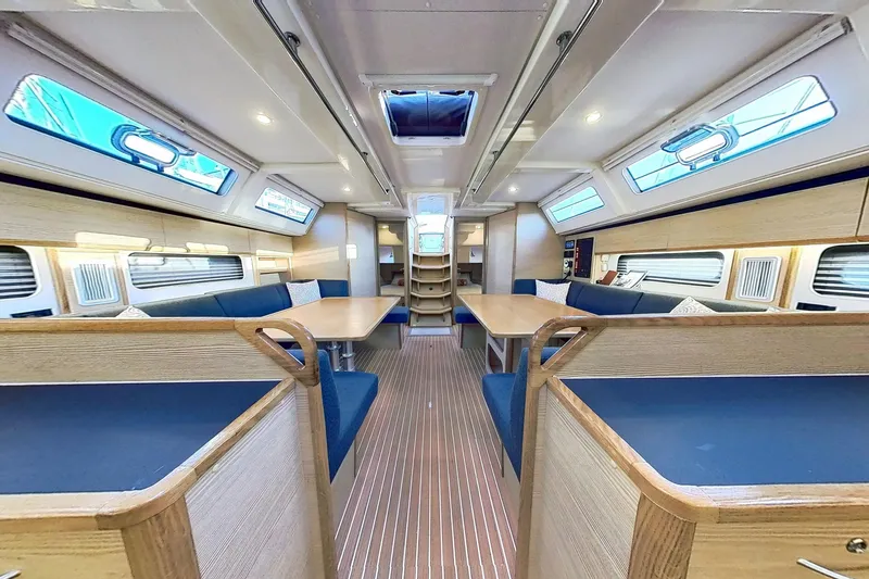 Slide: The Image of Luxurious interior of 2024 Kufner 54 yacht with modern seating and ample natural light. - 45