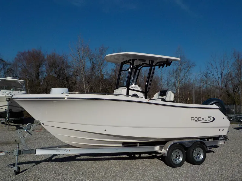 Slide: The Image of 2025 Robalo Explorer R232EX boat on trailer, side view. - 4