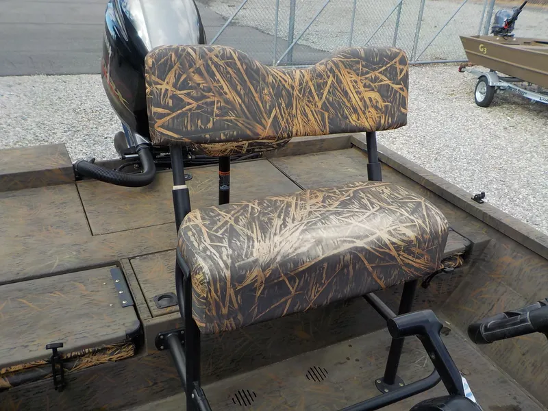 Slide: The Image of Camouflage seating on 2022 G3 Bay 22 GX boat, featuring a powerful outboard motor. - 12