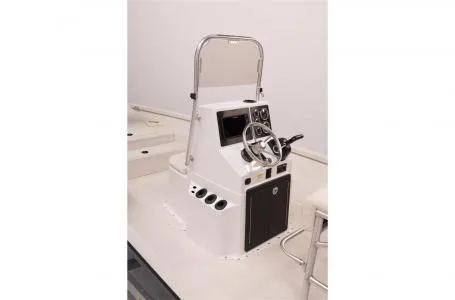 Slide: The Image of 2022 G3 Bay 22 GX boat console with steering wheel and controls. - 7