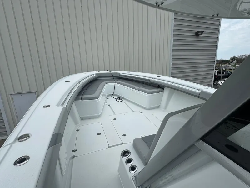 Slide: The Image of 2017 Yellowfin 39 Offshore boat interior with seating and storage compartments. - 18